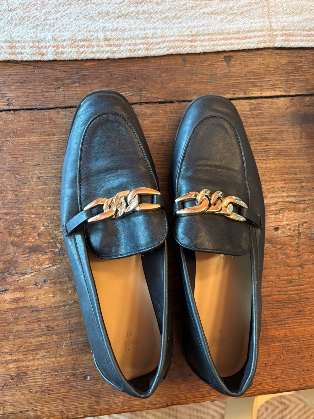 H&M Black Faux Leather Slip-On Loafers with Gold Chain Accent